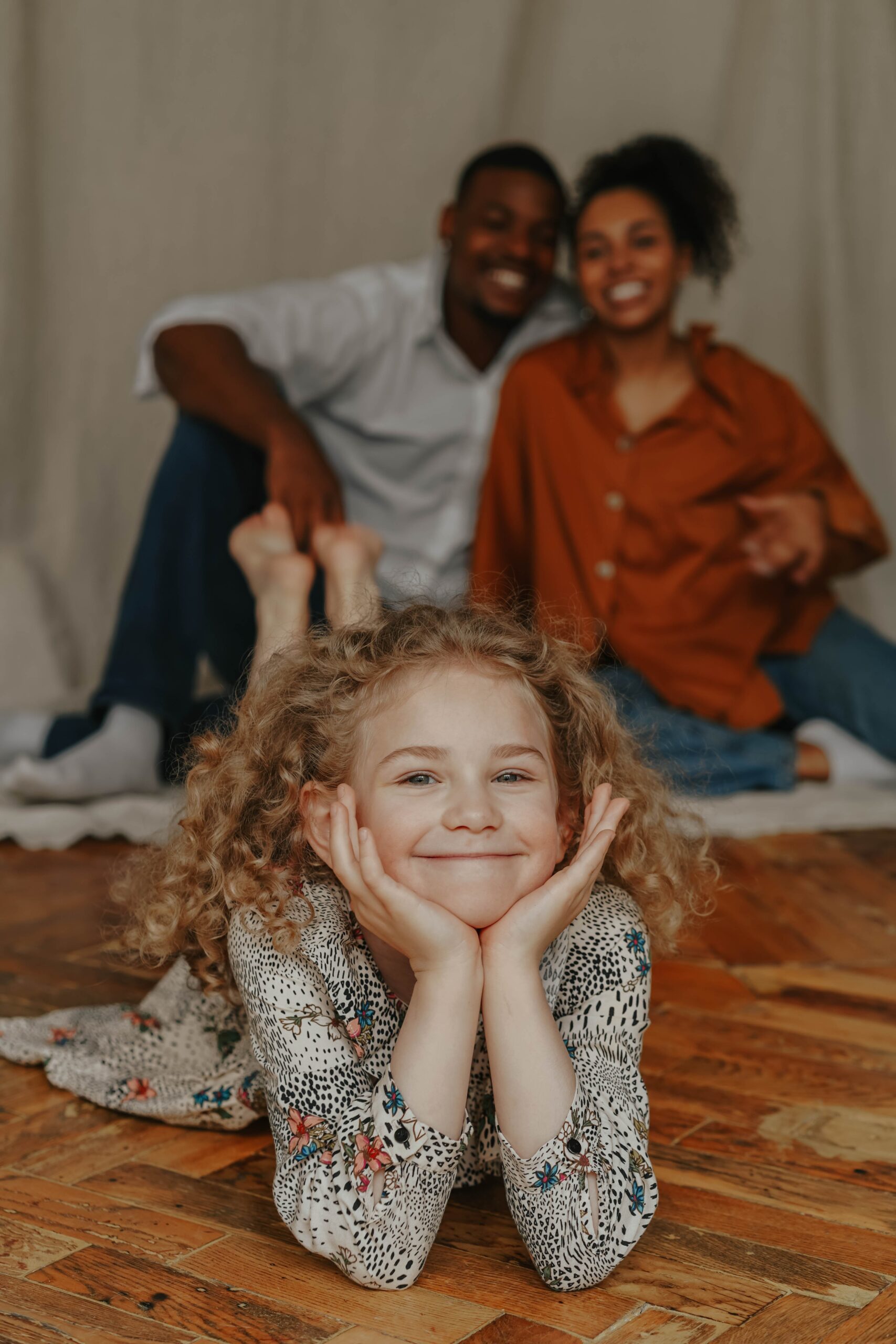 Adopted child with her parents